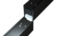 Linear LED housing with open end revealing mounting points and internal connector area