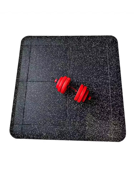 Dark speckled rubber gym mat with rounded corners and visible seams