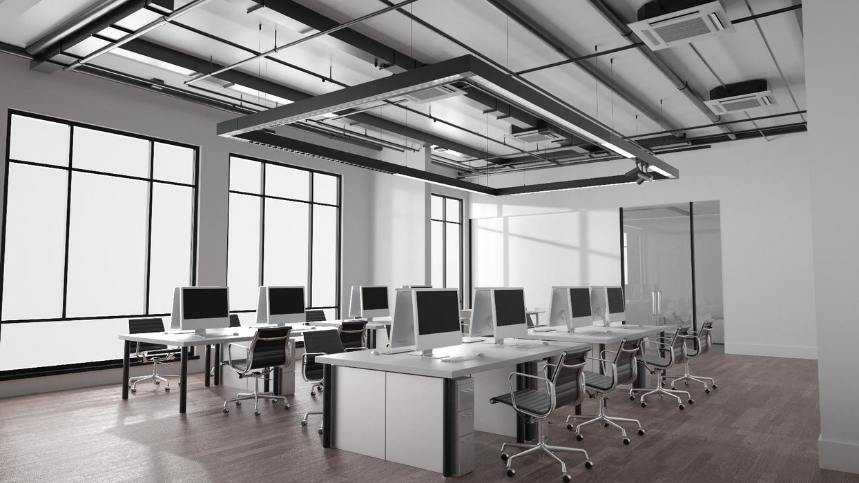Office meeting room with long conference table and rolling swivel chairs